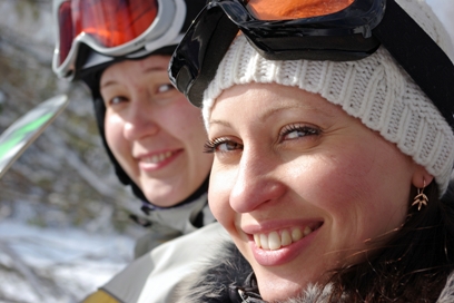 two_women_ski_gear